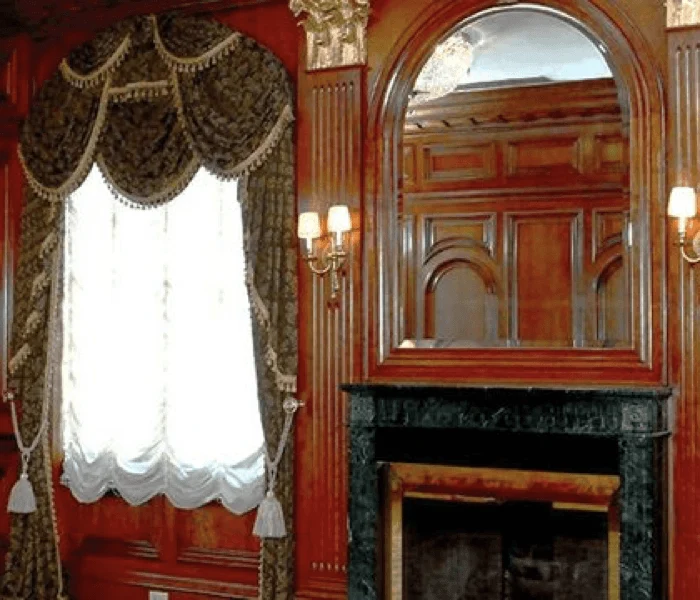 The Cherry Room at The Brownstone, intimate private dining with cherry paneling and 1920s character, up to 36 guests